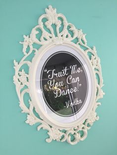 a mirror with the words trust me you can dance written in white lettering on it