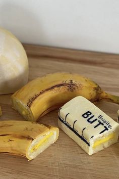 bananas, cheese and garlic on a wooden table