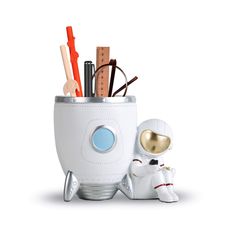 PRICES MAY VARY. Unique Design - This pencil holder has a Astronaut shape with a rocket, making your life full of fun. It is spacious enough to store and organize your stuff. It holds lots of pens and pencils makeup brush, keeps everything pretty organized and that will dress up your desk and table in a simple and elegant way. Stable and durable - The pencil sculpture is made of environmental resin, strong and odorless, not easy to age or discolor or rust or become brittle like other materials. Desk Pencil Holder, Resin Desk, Astronaut Theme, Pencil Holders For Desk, Desk Supplies, Pens And Pencils, Makeup Brush Holders, Desk Organizer, Gifts For Office