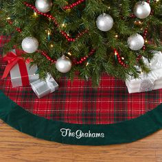 a christmas tree skirt with presents under it