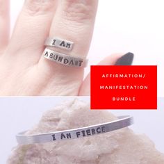 two different types of rings with the words affirmation, manifestationtation and i am fierce