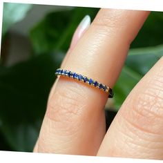 Natural Blue Sapphire Ring, 2mm Half Eternity Band, 18K Gold Ring, Blue Sapphire Band, Sapphire Wedding Band, September Blue Birthstone Ring ♥ Details Handmade to order * Ring size: US 3-10 (Please message me for sizes larger than 10 or smaller than 3 : ) * Metal: Solid 18K Gold (available in 14K and 18K White, Yellow and Rose Gold, and 950 platinum) * Total Carat Weight: 0.35 carats * Number of Stones: 19 * Stone size: 1.5mm each * Gemstone type: Natural Blue Sapphires * Gemstone Cut: Round Bri Blue 14k Gold Stackable Promise Rings, Blue Round Eternity Band With Prong Setting, 14k Gold Sapphire Stackable Ring, Stackable Yellow Gold Sapphire Birthstone Ring, Stackable Blue Sapphire Ring In 14k Gold, Blue Sapphire Stackable Ring In 14k Gold, Stackable 14k Gold Blue Sapphire Ring, Blue Eternity Band For Promise, Stackable Sapphire Ring For Promise