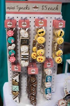 several bracelets are on display for sale in a store with embellishments