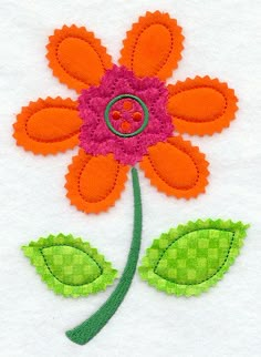 an orange and pink flower with green leaves on the bottom is embroidered onto white fabric