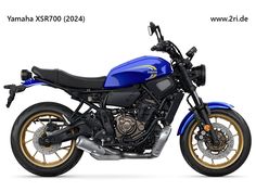 a blue motorcycle parked on top of a white background with the words yamaha xsrt200 - 24