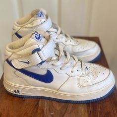 -2002 Nike Air Force 1 306603 141 -Mid White With Royal Blue -Us Size 6y Converts To Women 7.5 -These Sneakers Have Been In Storage Since 2004 -My Daughter Bought These When She Was In High School And Working At Foot Locker Part-Time -These Sneakers Are In Top Excellent Condition! -No Scuffs. Leather Shows No Signs Of Wear Or Tear -Original Shoe Laces -Made In Vietnam Vintage Nike Blue Sneakers, Vintage Blue Nike Sneakers, Nike Vintage High-top Sneakers With Round Toe, Vintage Nike High-top Sneakers With Round Toe, Vintage Blue Sneakers With Round Toe, Blue Air Force 1, Nike Air Force Mid, Blue Air, Air Force 1 High