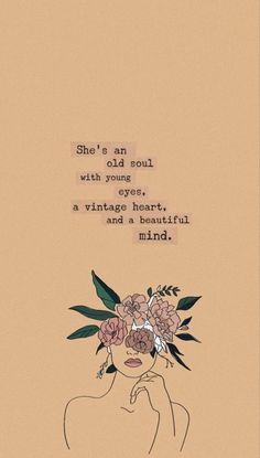 a woman with flowers in her hair and the words she's an old soul