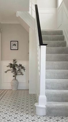 the stairs in this house are painted white