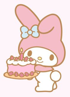 a hello kitty holding a birthday cake