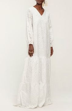 Dainty eyelets fleck the embroidered cotton fabric on this artful long dress that checks off the boxes on elegance and stylish drama. Slips on over head V-neck Long sleeves with elastic cuffs Lined 100% cotton Machine wash, line dry Made in Senegal Black Owned/Founded White Cotton Maxi Dress With Broderie Anglaise, Cotton Maxi Dress With Broderie Anglaise For Daywear, Eyelet Dress, Long Sleeve Maxi, Anniversary Sale, Nordstrom Dresses, Checks, Long Dress, White Dress