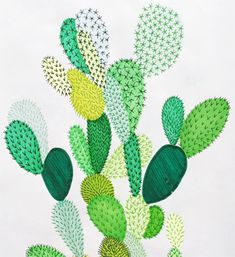 a drawing of green and yellow cactuses on white paper