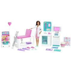 a barbie doll is standing next to a toy kitchen and play set with accessories for the doll