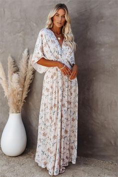 Best Seller The breathtaking Amelia Floral Kimono Maxi Dress features a print in mauve. blue. white and green over a blush base. Fall Family Photo Outfits, Kimono Maxi Dress, Party Dress Long Sleeve, Family Photo Outfits, Puff Sleeve Dresses, Linnet, Lined Skirt, Floral Kimono, Kimono Dress