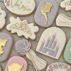 some decorated cookies are sitting on a table