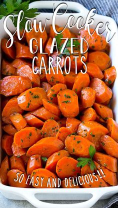 slow cooker glazed carrots in a white casserole dish with parsley on top