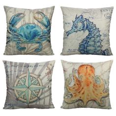 four decorative pillows with sea creatures on them