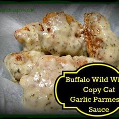 some kind of food that is on top of wax paper with the words buffalo wild wings copy cat garlic parmesan sauce