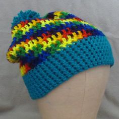 Hand Crafted Rainbow & Teal Color Block With Teal Pom Pom Cozy Warm Acrylic Beanie Hat New With Tags - Designed & Handcrafted By Me Alex 8 Colorful Rainbow Color Block With Teal Pom Pom Perfect For Dopamine Dressing Cold Weather Essential Item For Cozy Warmth & Comfort Hat Can Be Worn Snug To The Head Or Semi Slouchy High Quality 100% Acrylic - Some Stretch One Size Fits Most Youth To Adult Hand Made In The Usa Hand Or Machine Wash Cold Gentle Cycle, Dry Flat Or Tumble Dry Warm Approximate Relax Playful Blue Winter Beanie, Blue Acrylic Yarn Winter Hat, Cute Blue Winter Hat, Blue Warm Beanie One Size, Colorful Casual Beanie Hat, One Size Blue Beanie Cap, Cute Multicolor Crochet Hat One Size, Blue One Size Beanie, Warm Blue Beanie One Size