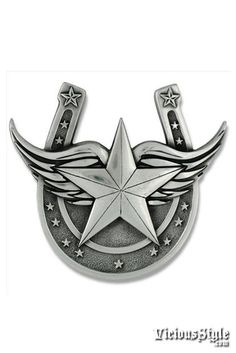 a metal badge with stars and wings on it