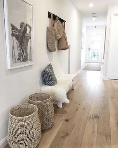 the hallway is clean and ready for us to use as an entrance way in this home