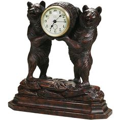 a clock with two bears standing on it's sides and holding their hands together