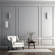 a white chair sitting next to a table on top of a hard wood floor in a living room