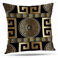 a black and gold pillow with an intricate design