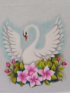 a white swan with pink flowers and green leaves