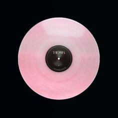 a pink vinyl record with the words evcuit on it