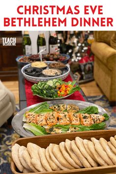 christmas eve bethehem dinner with bread and salads on the table in front of it