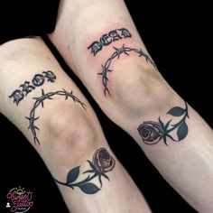 two tattoos on both legs with barbed wire and roses