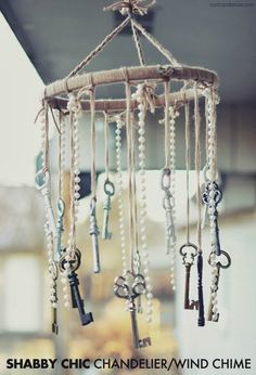 an old key wind chime hanging from the ceiling