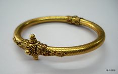 "sterling silver gold vermeil gold gilded Bangle Bracelet from Rajasthan India. great handmade design good for jewelry collection. Note - Please check pictures carefully for more detail. Inner diameter side to side - 5.8 cm(2.28\") Inner circumference - 17 cm (6.7\") width max. - 7 mm weight - 20 grams Material - sterling silver gold plate on top." Ornate Hallmarked Gold Bracelet, Gold Ornate Brass Cuff Bracelet, Byzantine Style Wedding Bracelet Jewelry, Antique Gold Bracelets For Festivals, Antique Gold Bangle For Gift, Yellow Gold Brass Bangle With Intricate Design, Ornate Gold Brass Bangle, Yellow Gold Byzantine Bangle Bracelet, Gold Byzantine Jewelry For Festivals