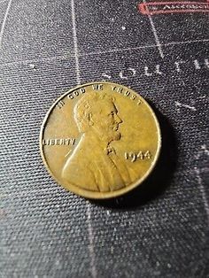 a penny sitting on top of a table