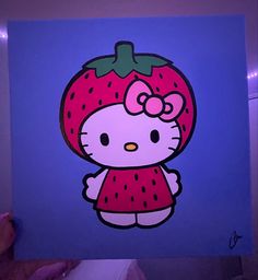 a painting of a hello kitty strawberry on a blue background