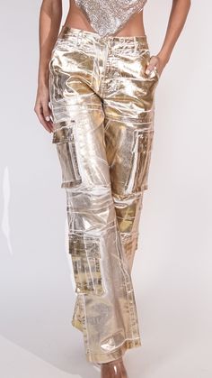 Introducing our statement-making gold metallic distress pants, blending edgy cargo style with a touch of glamour. Crafted to perfection, these pants feature a luxurious metallic finish that catches the light with every movement, ensuring you stand out from the crowd. Features: Pants Cargo Style Pockets Gold Distress Texture 77475 P2-1-3 Rooftop Romance, Classy Pants, Distressed Pants, Gold Pants, Bling Fashion, Distressed Texture, Pants Cargo, Usa Outfit, Cargo Style