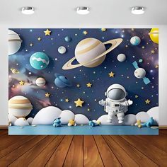 an image of a space scene with planets and stars on the wall, as well as a rocket ship