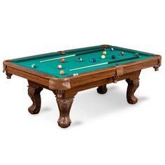 an antique pool table with green cloth and wooden legs, in the style of billiards