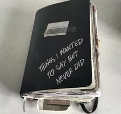 a black book with writing on it that says things i wanted to say but never did