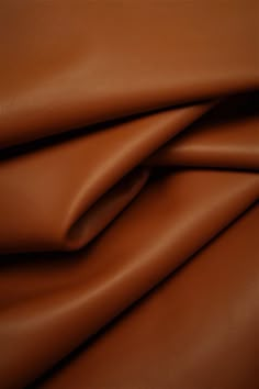 brown leather textured up close to the surface