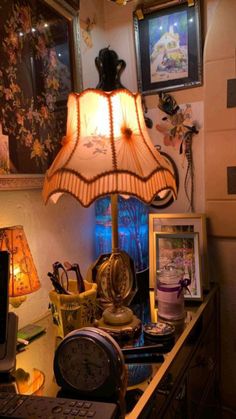 a lamp sitting on top of a wooden desk