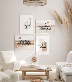 a living room filled with white furniture and pictures on the wall above it's coffee table