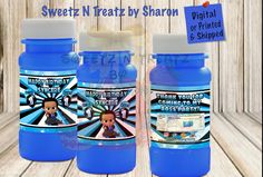 two blue water bottles sitting next to each other on a wooden surface with the words sweet n treat by sharon