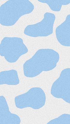 a blue and white animal print wallpaper that looks like it has spots on it