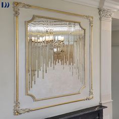 a large mirror mounted to the side of a wall next to a fireplace in a living room