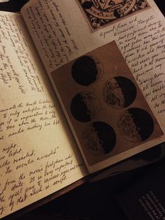 an open book with writing on it and some pictures in the pages next to it