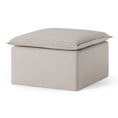 a large square ottoman with a cushion on the top and bottom, sitting in front of a white background