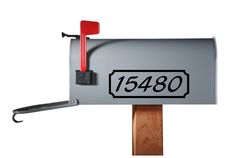 a mailbox with the number 1560 on it's side and a red handle