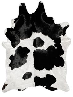 a black and white cowhide rug on a white background