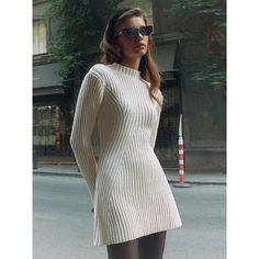 Discover Timeless Elegance Embrace your unique style with our latest addition, the Elegant Knitted O-Neck Mini Dress. Perfect for the fashion-forward woman, this dress blends comfort and elegance, making it a must-have in your autumn/winter wardrobe. Its sleek, ribbed design and long sleeves offer a chic, sophisticated look that's both versatile and timeless. Features That Define Style Material Composition: Crafted with high-quality synthetic fibers, offering durability and ease of care. Chic O- Knitted Dresses For Women Winter, Elegant Stretch Knitted Dress, Chic Knee-length Knitted Mini Dress, Chic Mini Length Sweater For Spring, Chic Knitted Knee-length Mini Dress, Beige Stretch Mini Dress For Winter, Fall Stretch Knitted Mini Dress, Winter Beige Stretch Mini Dress, Fall Knitted Stretch Mini Dress